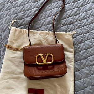 Valentino Vsling bag small, tan color used once. Stickers still intact.